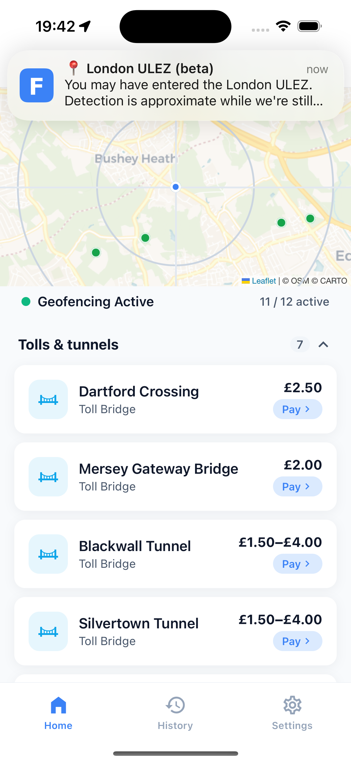 Alert history showing a London ULEZ entry with Pay and Mark-as-paid buttons